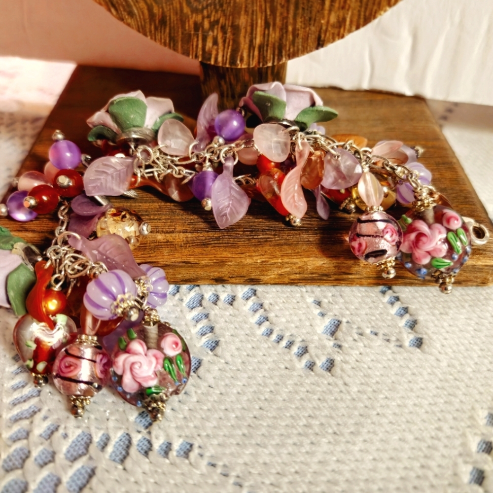 Pastel charm bracelet with porcelain florals.